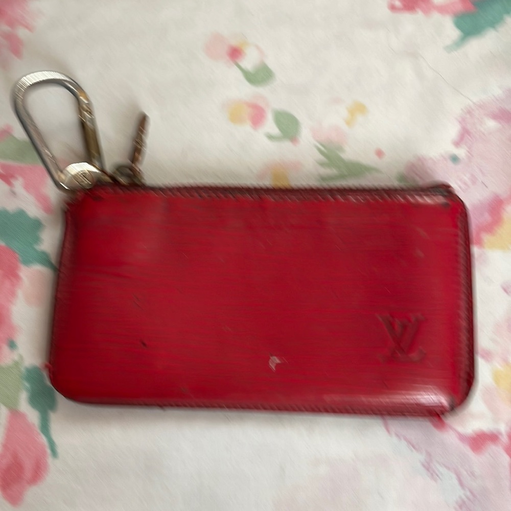 very used red leather Louis Vuitton keychain authentic